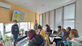 Seminar room with presenter and participants